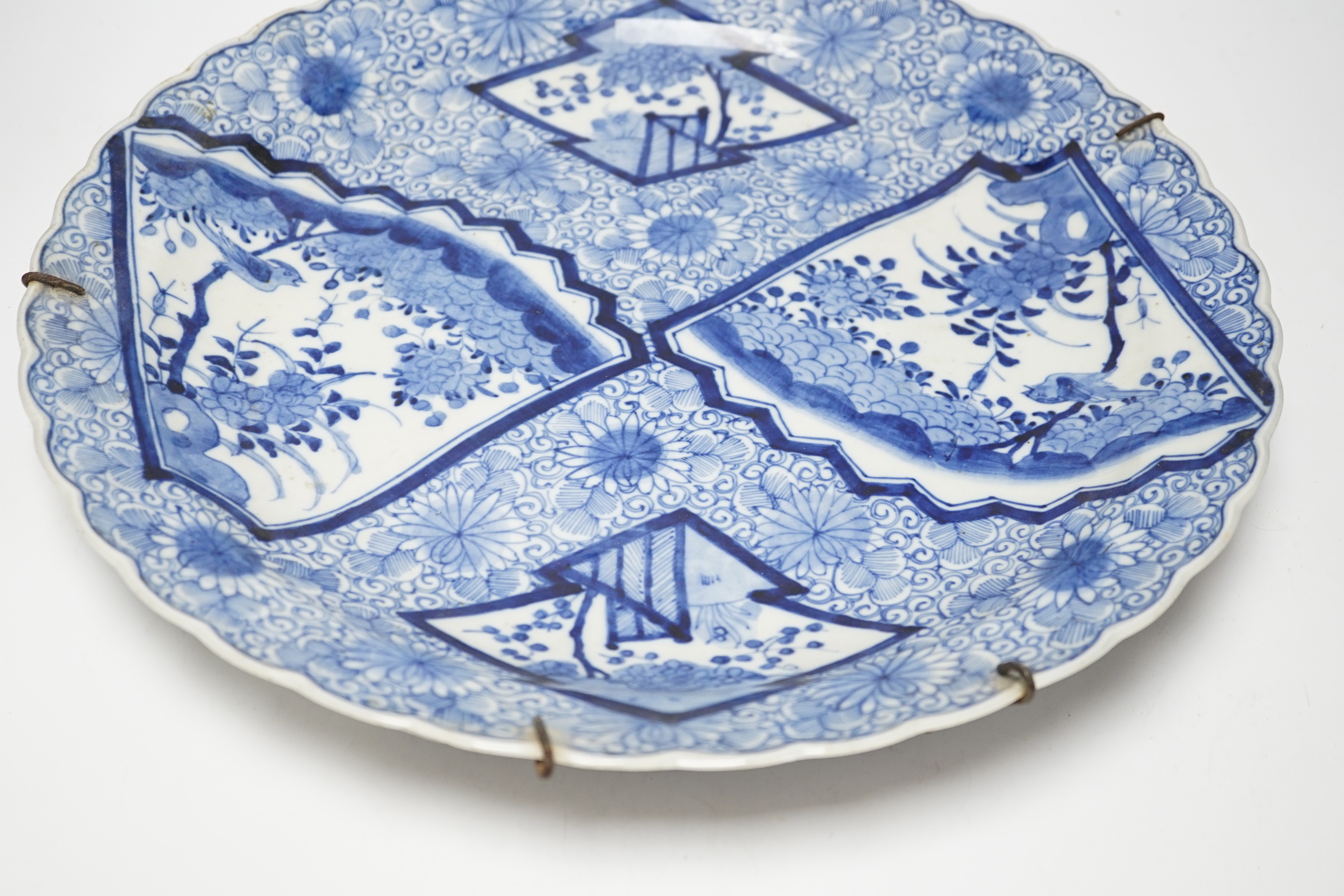 A Japanese blue and white charger, early 20th century, 40cm diameter